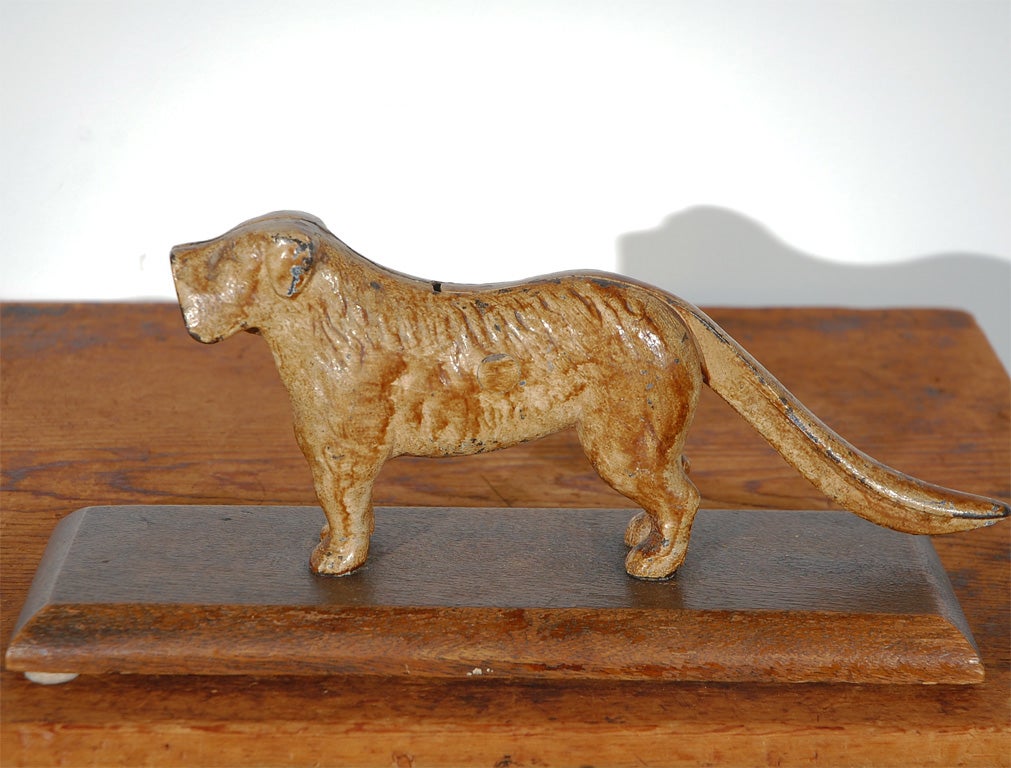 19THC ORIGINAL PAINTED NUTCRACKER/IRON DOG ON BOARD