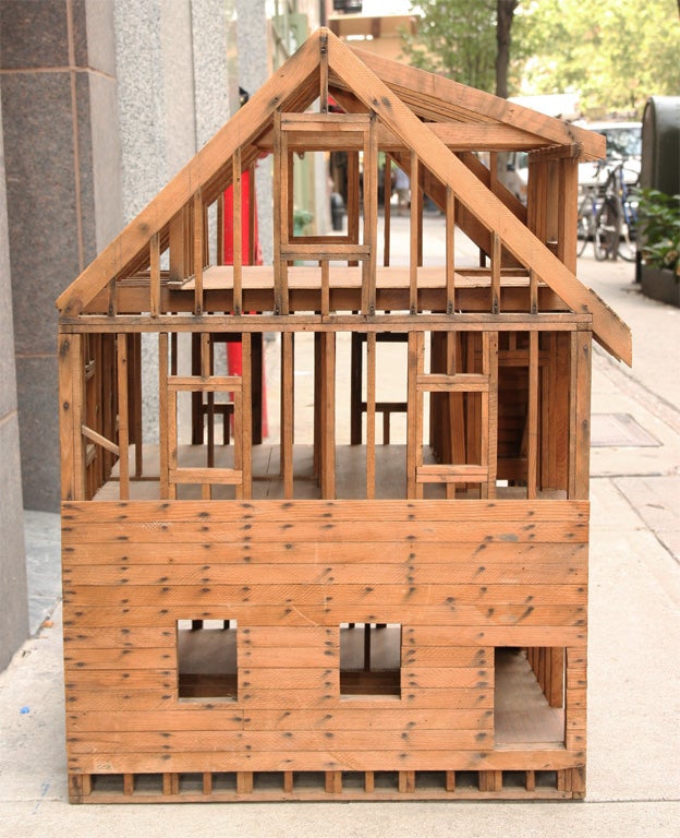 This wonderful three story Scale model of a home illustrates the balloon frame construction style.