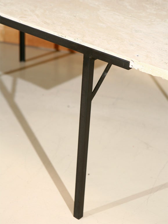 Simple Travertine cocktail table by Lawson-Fenning.  Custom sizes available.  Show in travertine and black steel base. Indoor/ outdoor use applies.