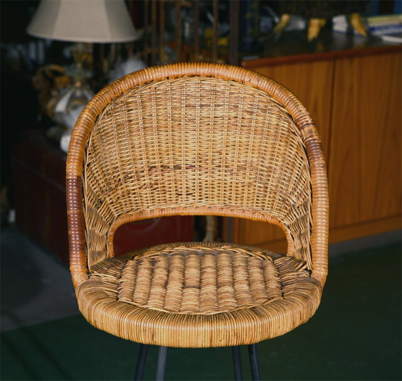 Four Rattan and Iron Swival Barstools