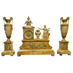 Antique AN EMPIRE STYLE CLOCK GARNITURE. FRENCH, C. 1880