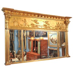 A REGENCY STYLE OVERMANTEL MIRROR. ENGLISH,  MID 19th CENTURY