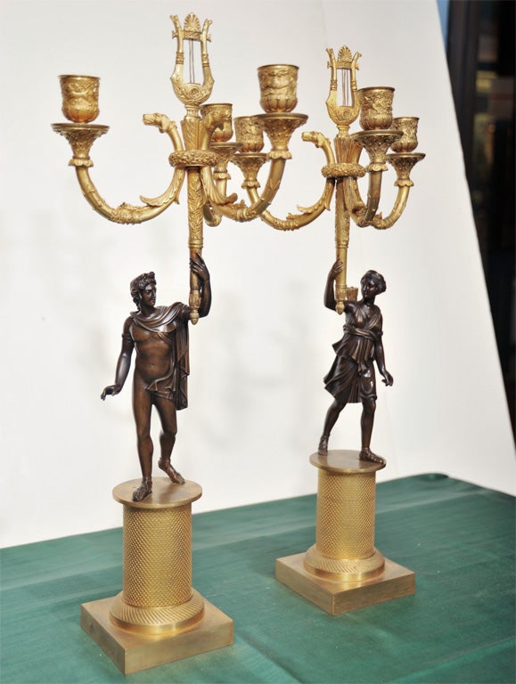 A PAIR OF CHARLES X STYLE FIGURAL CANDELABRA. FRENCH, C. 1850