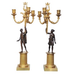 A PAIR OF CHARLES X STYLE FIGURAL CANDELABRA. FRENCH, C. 1850