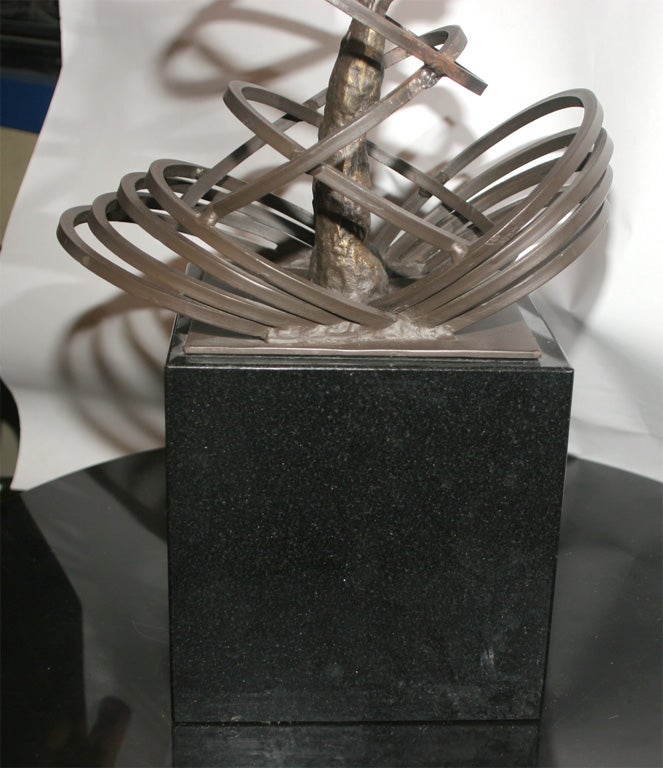 A Modernist Bronze Sculpture Man Diving thru Hoops 2