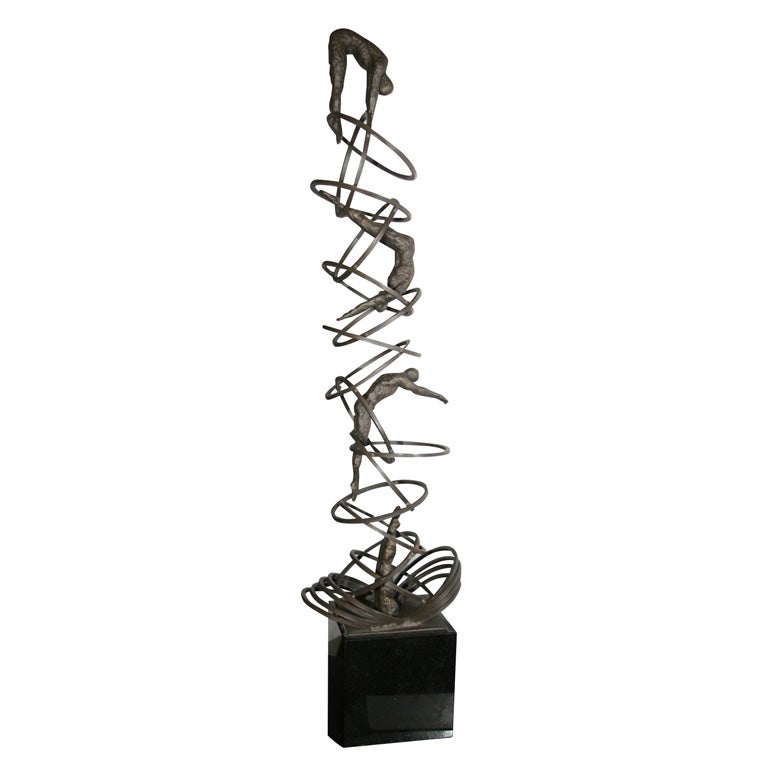 A Modernist Bronze Sculpture Man Diving thru Hoops