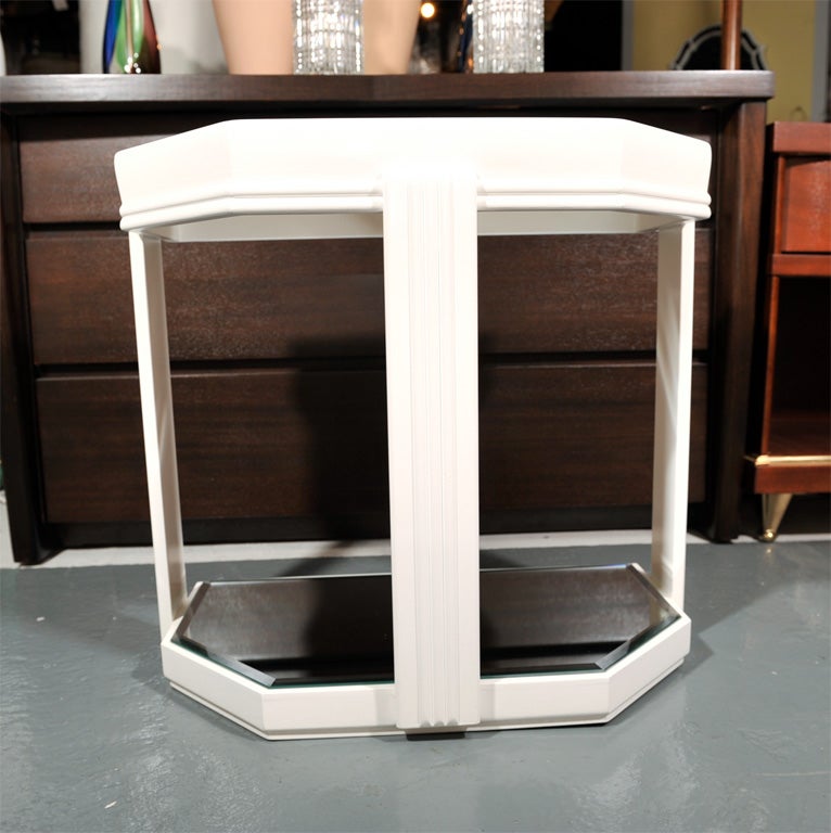 Pair of outstanding end tables with skyscraper columns. Also available coffee table in black lacquer from the same series.