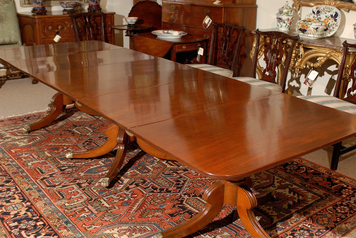 Fine Regency  Mahogany Triple Pedestal Dining Table In Excellent Condition In Atlanta, GA