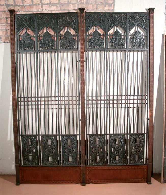 A remarkable pair of iron elevator doors from Adler & Sullivan's Chicago Stock Exchange building (c. 1893; demolished 1972). These extremely rare doors are from the private elevator of the Exchange and differ in design from those of the public