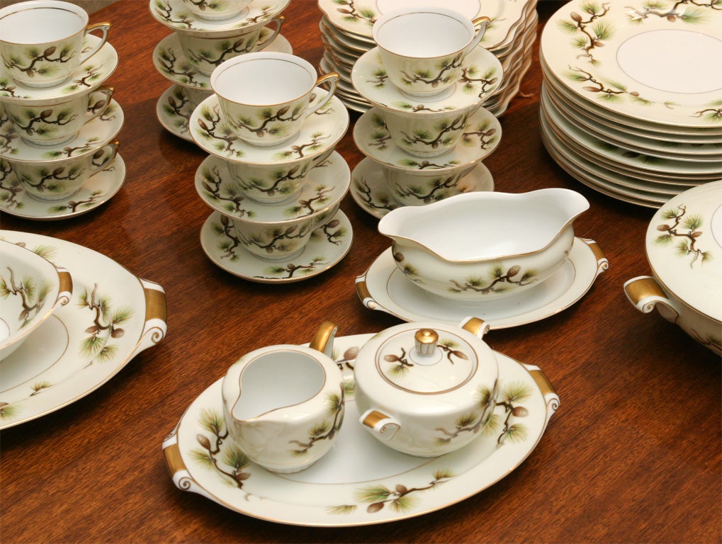 Shasta Pine by Narumi China.<br />
A whimsical and elegant pine cone themed service for twelve.<br />
Porcelain with transfer pattern and gold trim. <br />
Complete service as shown and in excellent condition.