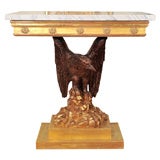 A Pair of White Marble and Parcel Gilt Eagle Consoles