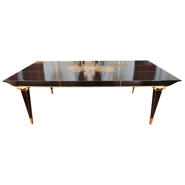 An Art Deco Ebony and Ormolu Mounted Dining Table For Sale
