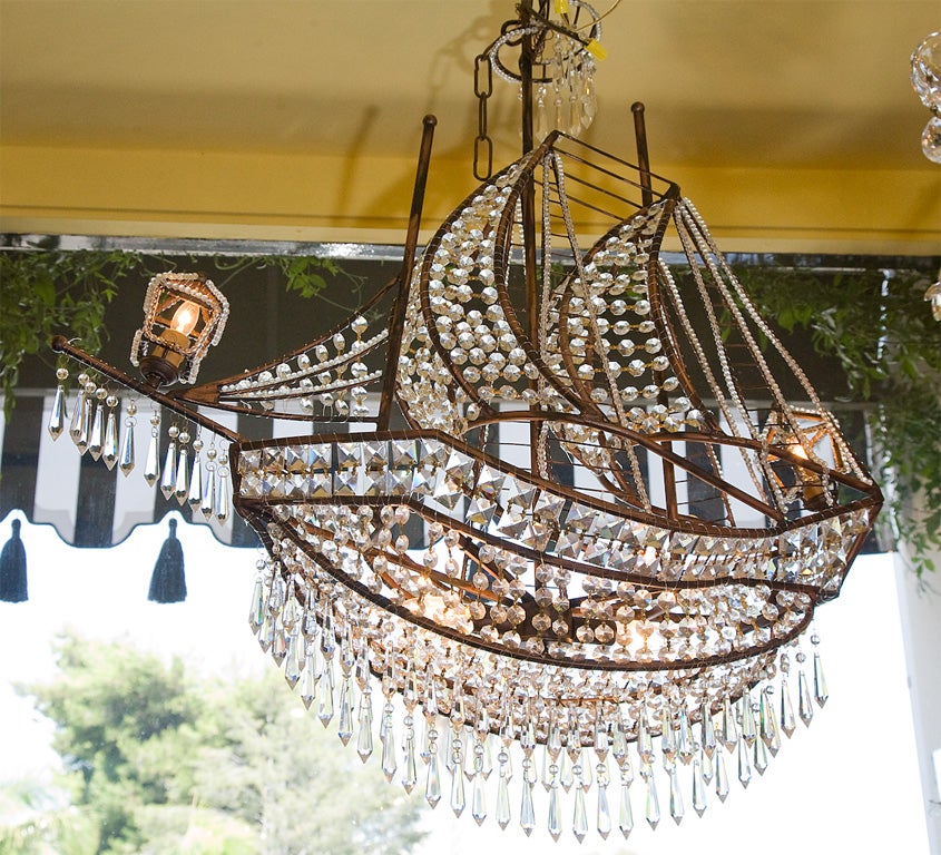 JUST A GREAT VINTAGE SHIP CHANDLELIER!<br />
ALL CRYSTALS IRON AND 2 LIGHTS~<br />
FOR MORE FABULOUS LIGHTING PLEASE GO TO MY 1STDIBS STORE<br />
LAMPS,CHANDELIERS,GIRONDOLES,SETTEES,BERGERES,SOFAS,CABINETS,MIRROS,BARS,BAR STOOLS,CONSOLES