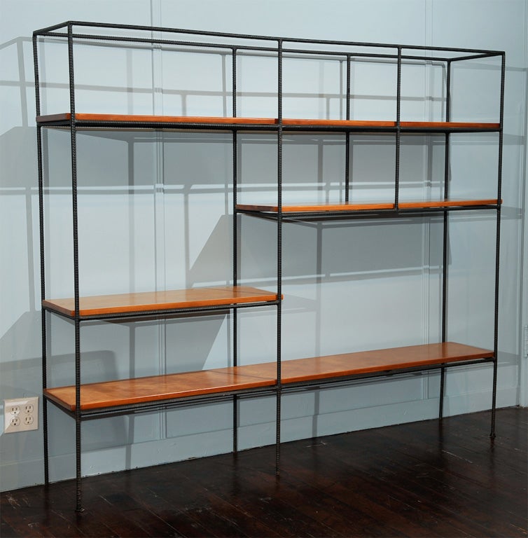 Rare California modern design by the Pacific Group lead by Muriel Coleman, metal with redwood shelves.