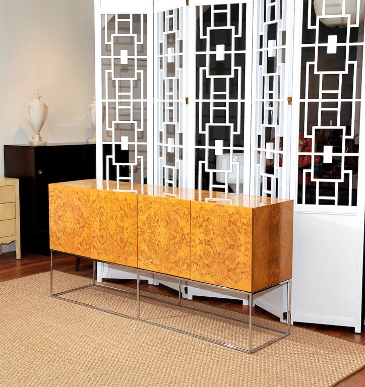 Stunning olive wood and chrome credenza designed by Milo Baughman for Thayer-Coggin. Completely restored.