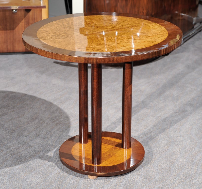 Here is an Art Deco table for all occasions. Great style, beautiful woods and wonderful hand made construction. Can be used as an elegant side table, between two chairs or as a coffee table. Limited only by your imagination. Exotic veneers of flamed