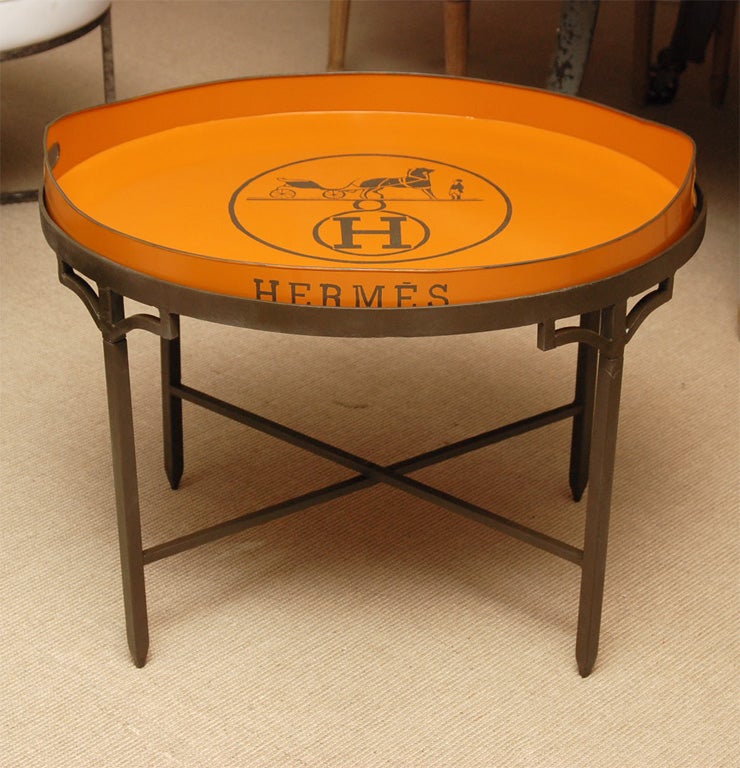 Attractive hand painted Hermes tole tray on wrought iron stand. The tray is removable and can be hung. The tray can be purchased alone for $850