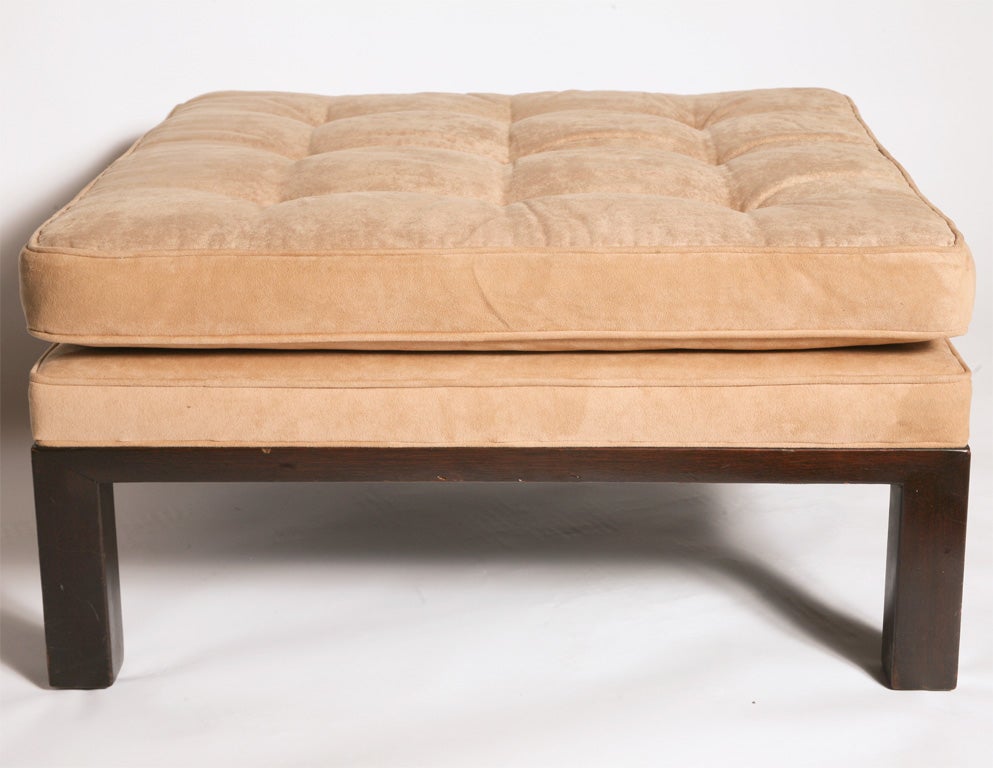 Pair of Edward Wormley for Dunbar Ottomans<br />
model #5314, ultra suede and mahogany<br />
priced as a pair