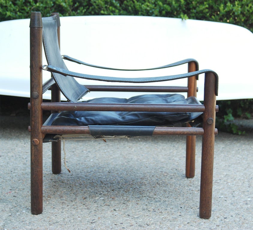 Wood Arne Norell leather chairs
