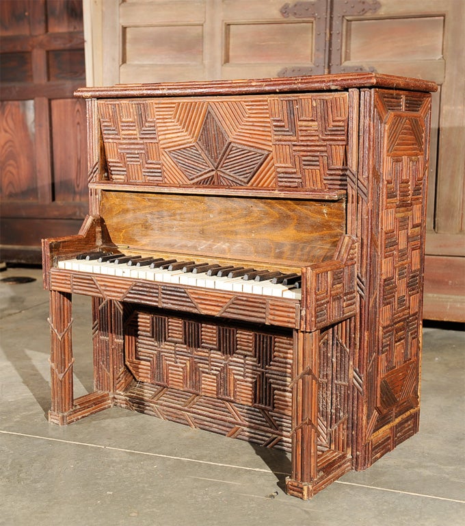A small piano constructed by craftsmen in the Adirondacks in upstate New York.