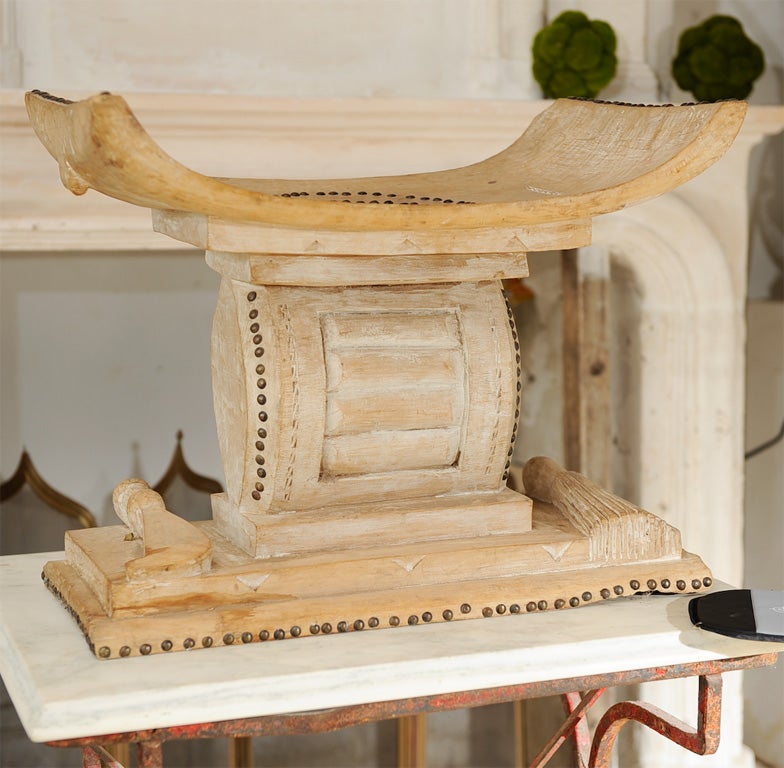 Handsome mid-century carved wooden African stool, w/ studs