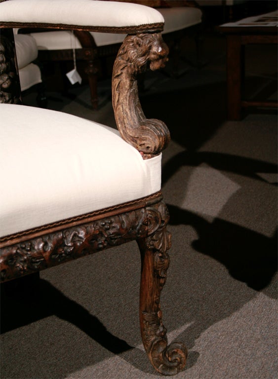 Chestnut Pair of Italian Carved Hall Chairs For Sale