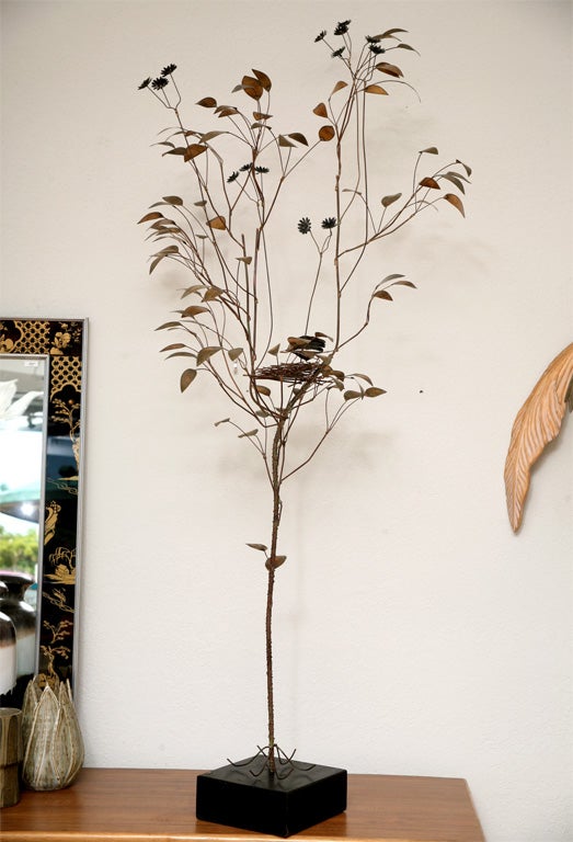 One of our favorite Curtis Jere pieces, we love this delicate, whimsical, copper tree, complete with a brass Mama bird perched in her nest, watching over three gilded eggs. A wonderful nursery addition! Jere plaque on base.