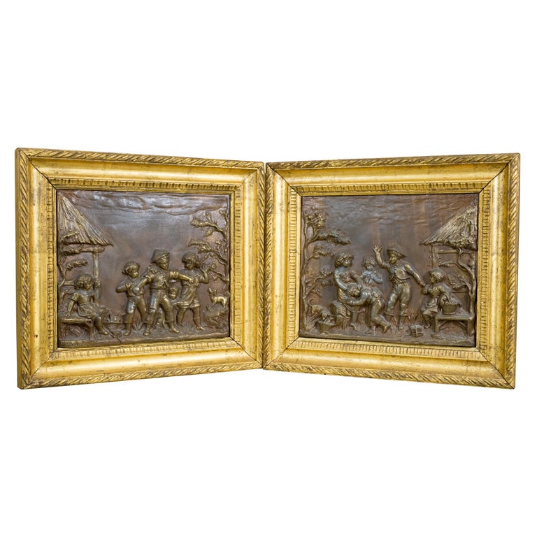 Pair of Gilt Framed Zinc Relief Panels For Sale