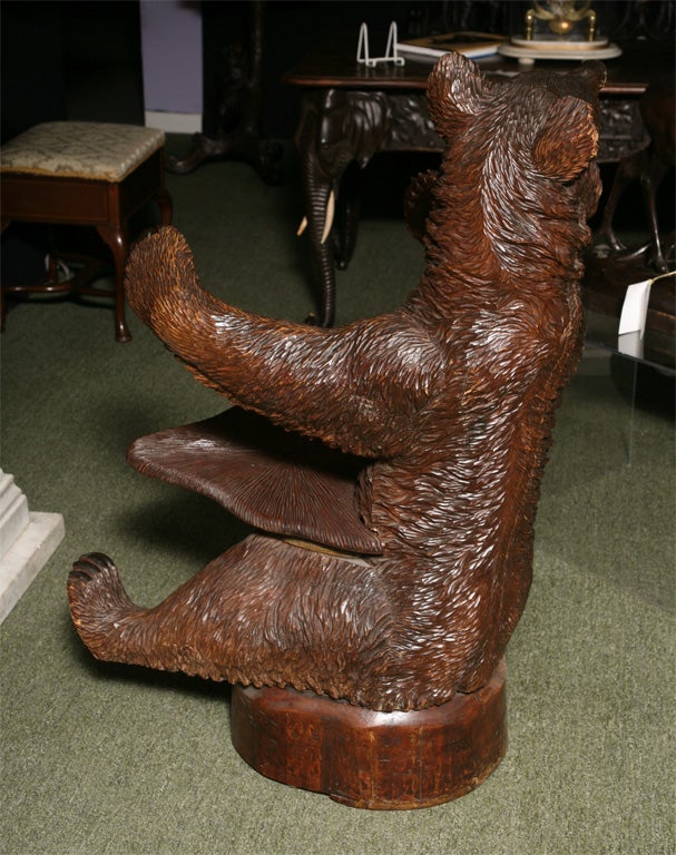 Carved A very rare Black Forest bear chair. For Sale