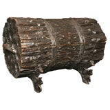 A Black Forest carved log box.