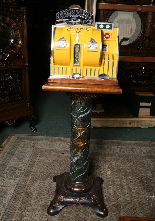 A Bally Reliance Craps playing slot machine with $ 25 Jackpot, this machine plays quarters making it a much rarer machine.<br />
Our macihnes are all in the finest condition, each machine is checked for authenticity and quality, we have 30 years