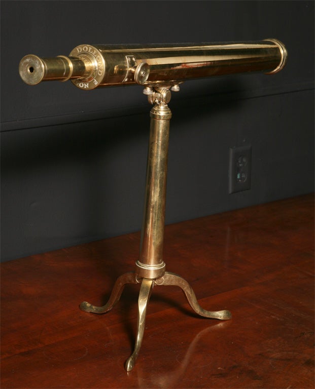 A 19th century brass telescope on stand.