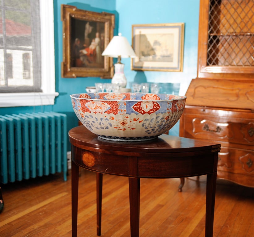Exceptionally large Japanese, Edo Period (1688-1868) Imari Punch Bowl featuring paneled designs in underglazed cobalt and overglazed red enamels.  Made for the European Market.
