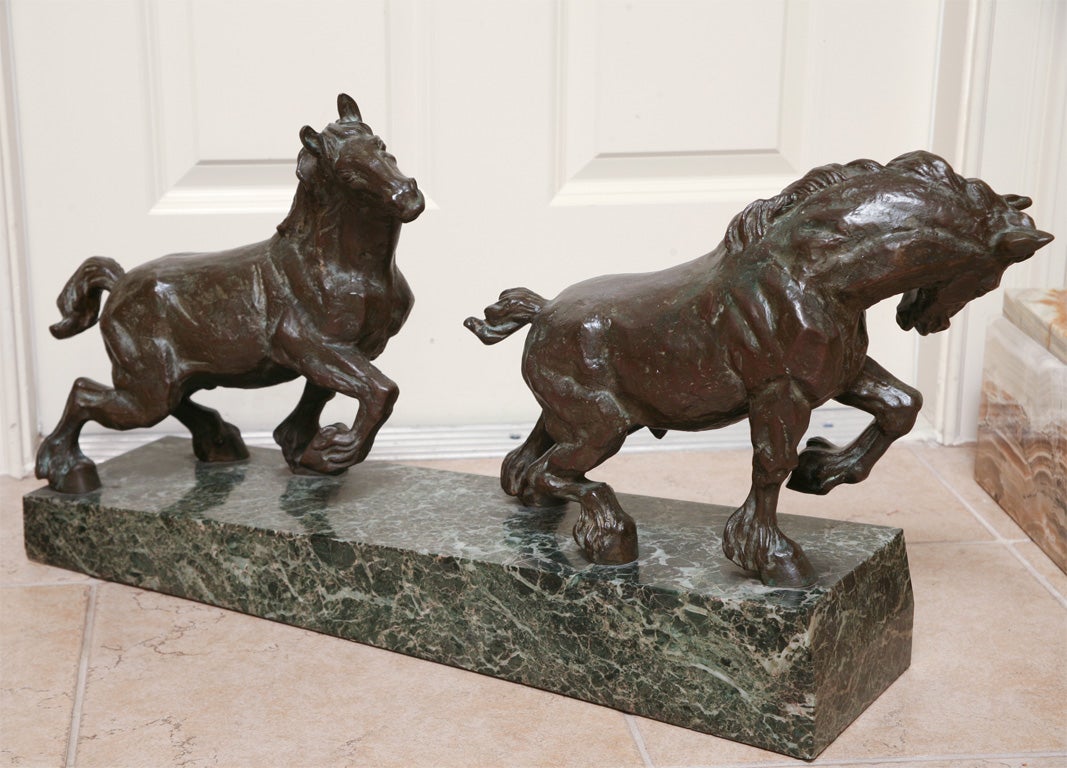Beautifully cast Clydesdale Horses on original inclined marble base.