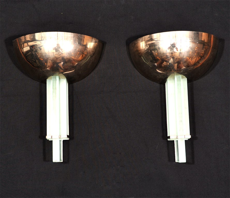 Pair of Genet & Michon French Art Deco wall sconces in chrome and clear glass, circa 1930s.