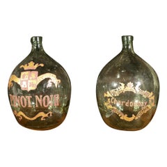 Antique Two glass wine bottles