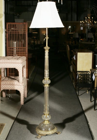 A monumental bronze and Baccarat crystal floor lamp. Lamp shade is not original and is sold separately.