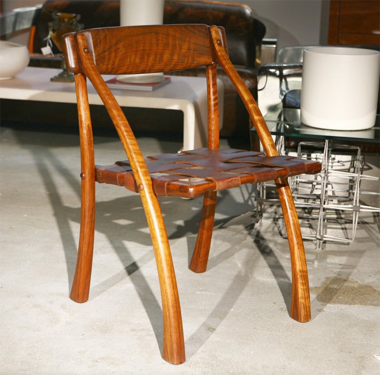 Arthur Espenet Carpenter sedua wishbone chair in walnut with leather straps, circa 1972 stamped