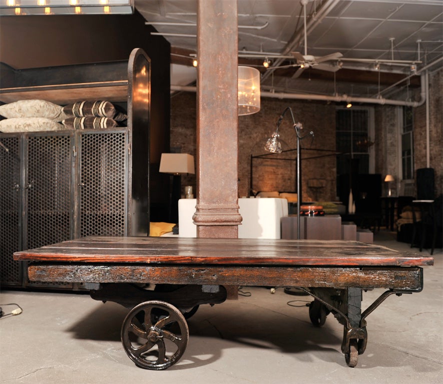 Cart with antique wood top and cast iron wheels.