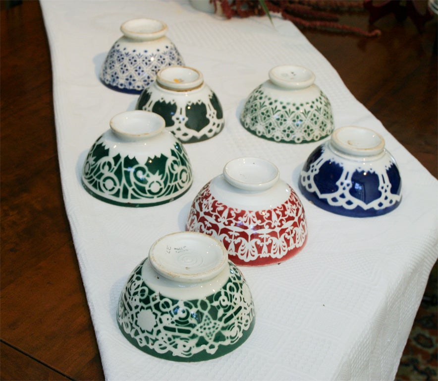 These 1930 bowls, were used by the French, for there coffee ( cafe Au Lait), who preferred drinking coffee with their hands around the bowl, rather than a lip, to hold the coffee. Each stenciled design is unique and the colors of red, green and