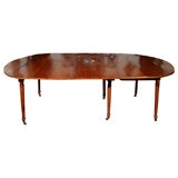 A FRENCH CHERRYWOOD DINING TABLE
