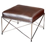 Silver Leather ottaman with chrome legs