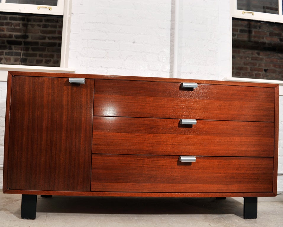 George Nelson walnut dresser with J pulls, mfg. Herman Miller. It is from the 1952 catalog-basic series.