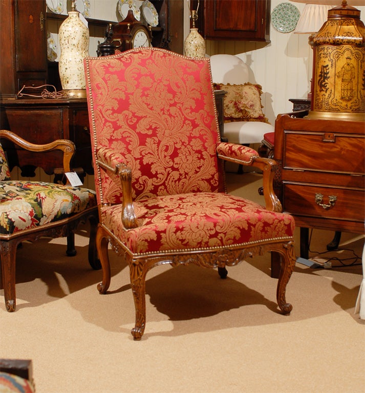 Pair of French Regence style Arm Chairs
