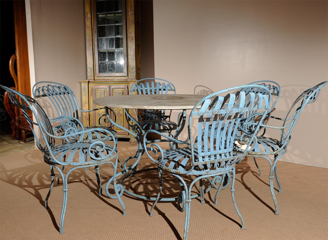 Painted steel-strap garden table and chairs