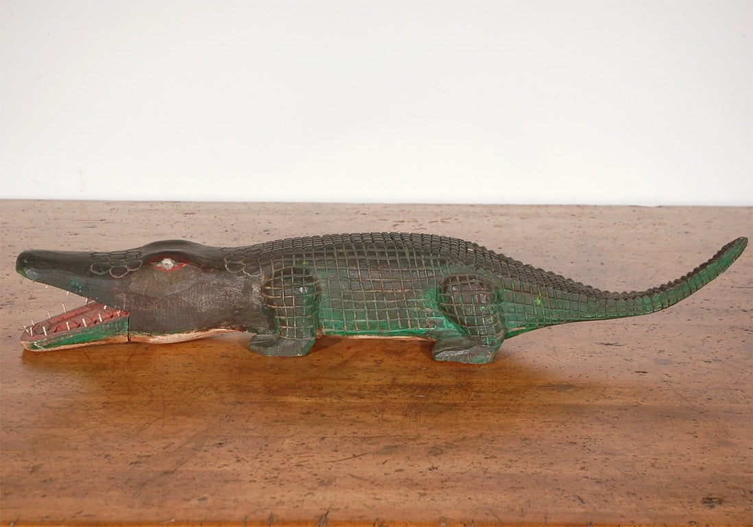 Post World War II carved alligator with an articulated mouth.  Attributed to a WWII vet in Minnesota in the 50's.