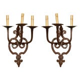 Pair antique French provincial iron "fleur de lis" sconces.