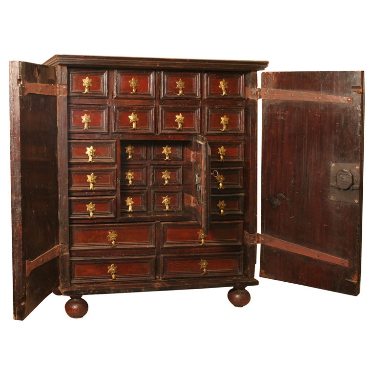 A Flemish Walnut Collector Cabinet With Doors