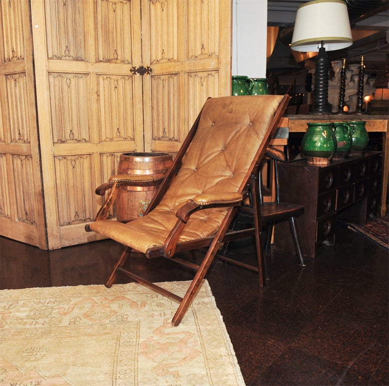 Quirky English leather and mahogany Campaign chair