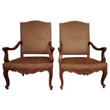 Set of four Large French Regence style Open Arm Chairs
